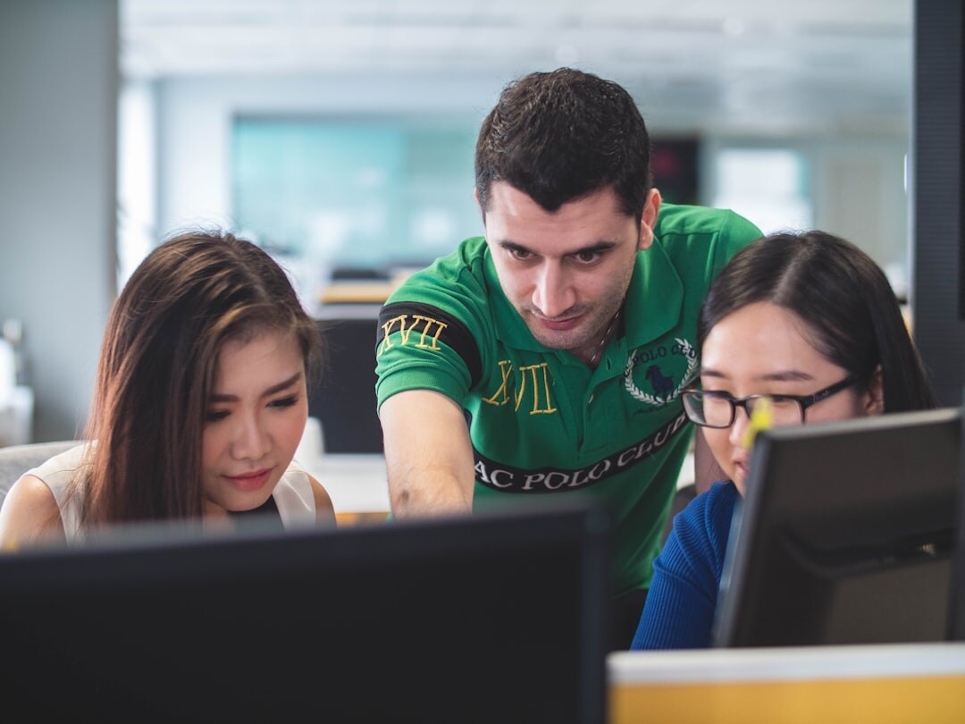students coding together in classroom