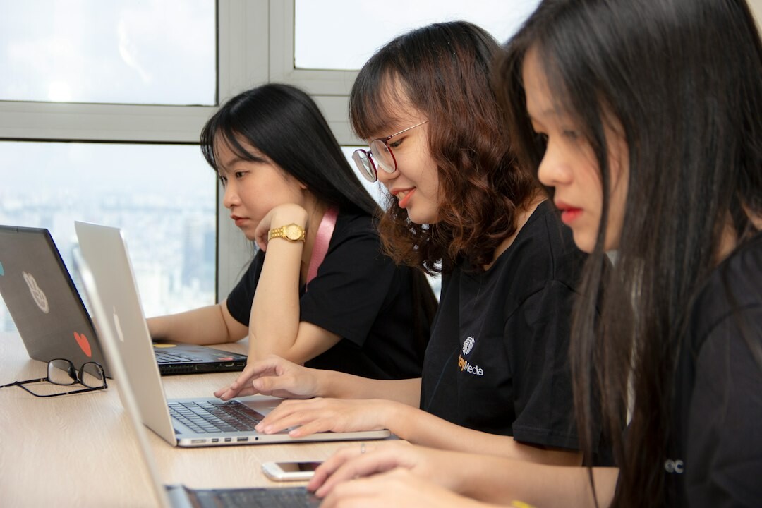 group of students learning to code