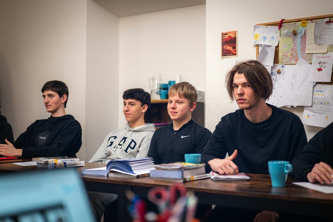students coding together in classroom