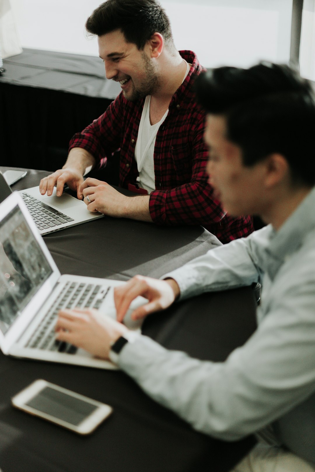 team meeting with laptops